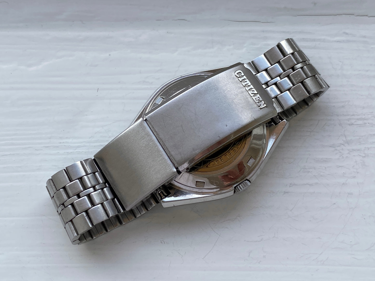 Vintage Citizen Automatic watch with a green marbled dial, gold markers, day-date feature, stainless steel bracelet, 6501 movement, bracelet and clasp view