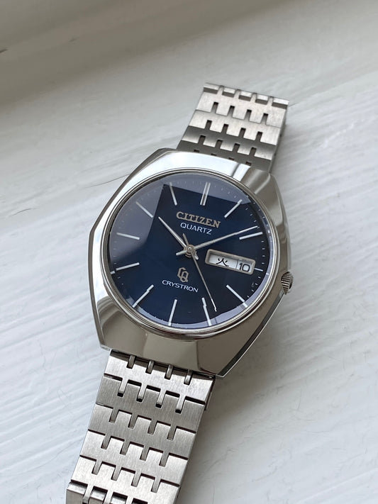 Vintage Citizen Crystron Quartz with faceted crystal and navy dial, NOS condition, front view